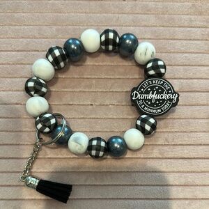 Black and White Beaded Bracelet with Tassel